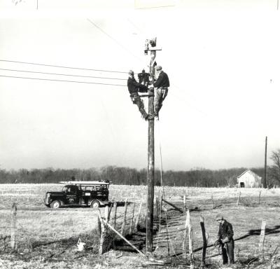 Image of early crews working to install electric service