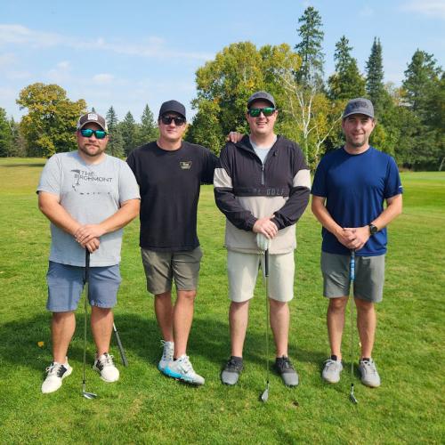 The Bemidji Sports Centre team of Austin Zetah, Jay Hill, Shane Teigland and Andy Wang pose for a photo on the golf course.
