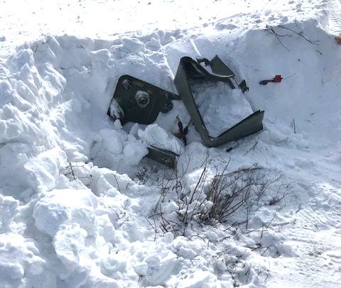 Image of pedestal damaged by snowplow