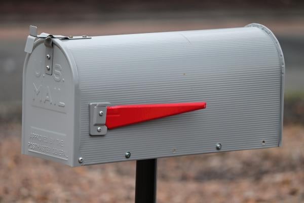 Gray USPS mail box