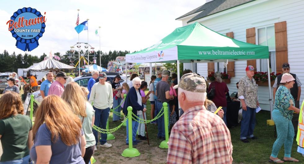 Members gathered to register for annual meeting at the fair